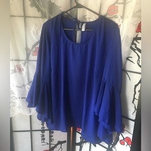 Live 4 Truth 2x bell sleeve blouse. Good condition.